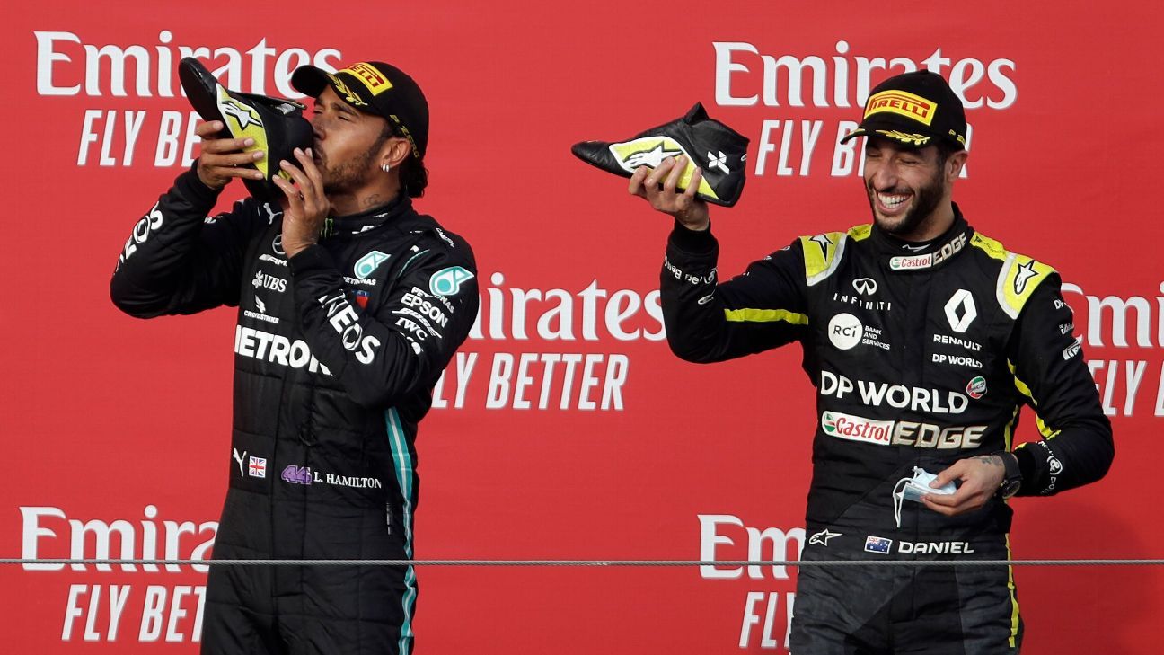 Lewis Hamilton celebrating a win by hitting a shoey with Daniel Ricciardo (Taken from: https://www.espn.in/f1/story/_/id/30242464/ricciardo-surprised-hamilton-took-part-shoey-celebration)